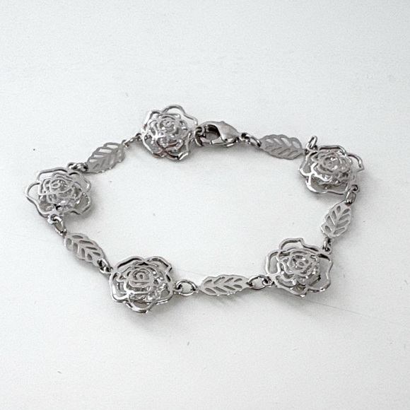 Jewelry - New! Elegant Silver Hollow Rose Bracelet With Clear Crystals Inside